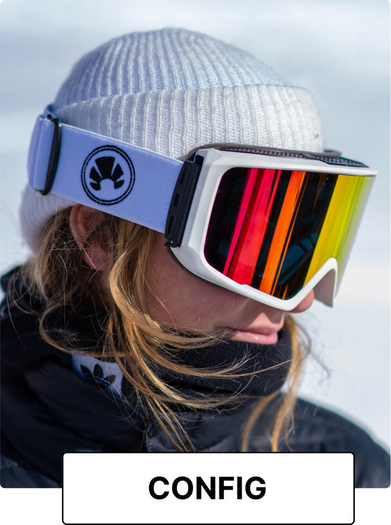 bakedsnow female ambassador wearing white magnetic snowboard goggles